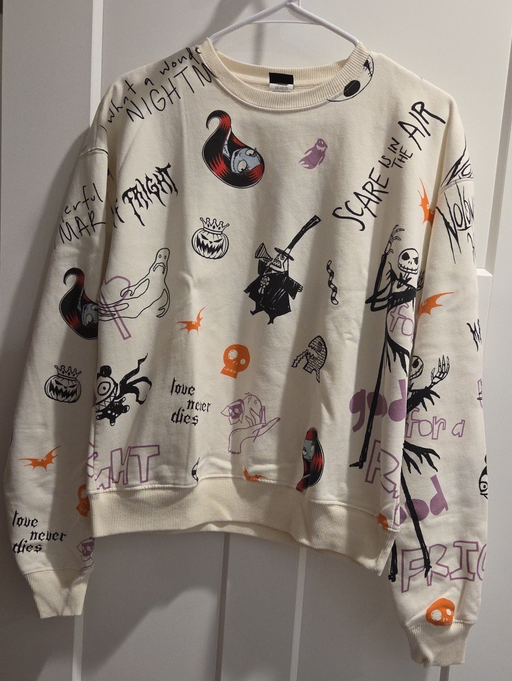 Disney Cream Halloween Graphic Sweatshirt with Black, Orange & Purple Prints